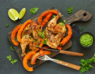 Wall Mural - Baked chicken with vegetables and pumpkin.