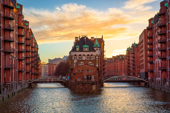 Wall Mural -  - The Warehouse district Speicherstadt during sunset in Hamburg, Germany. Old warehouses in Hafencity quarter in Hamburg.