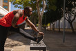 © Wavebreak Media - Man doing stretching exercise at bench on a sunny day