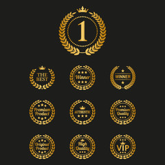 Set of golden laurel wreaths on black background.