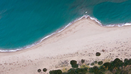 Aerial drone view of Sardinia blue sea and seashore