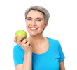 © Pixel-Shot - Mature woman with apple on white background