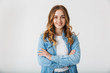 © Drobot Dean - Attractive young girl standing isolated over white
