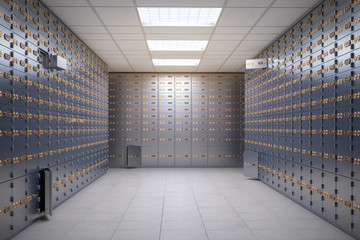 safe deposit boxes room inside of a bank vault.