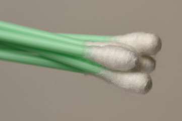 Close-up of cotton swabs on white background