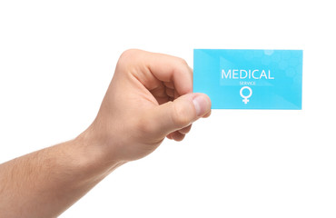 Wall Mural - Man holding medical business card isolated on white, closeup. Women's health service