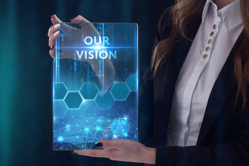 The concept of business, technology, the Internet and the network. A young entrepreneur working on a virtual screen of the future and sees the inscription: Our vision