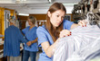 © JackF - Two women working at dry-cleaning salon