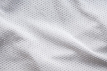 White fabric sport clothing football jersey with air mesh texture background