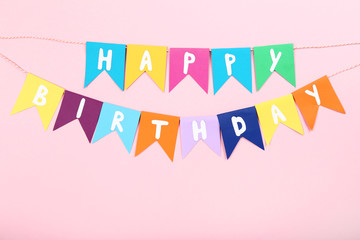 Canvas Print - Paper flags with text Happy Birthday on pink background