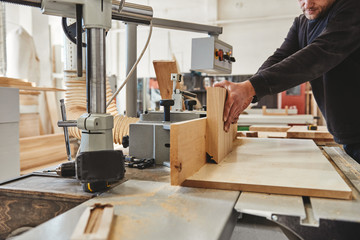 Artisans in Manufacturing. Cropped shot of craftsman working at his workstation