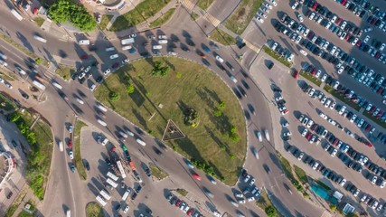Wall Mural - aerial 4k top view hyperlapse video of traffic in a circle
