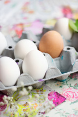 Wall Mural - White eggs in the cardboard box, prepared for decorating; Easter background