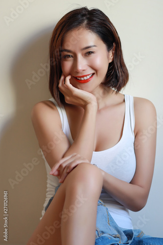 Portrait Of Attractive And Sexy Asian Woman Short Hair And White