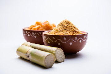 Wall Mural - Organic Gur or Jggery Powder is unrefined sugar obtained from concentrated sugarcane juice. served in a bowl. selective focus