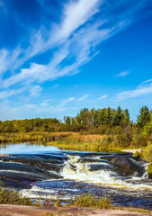 Wall Mural - Magnificent rapids on the smooth stones