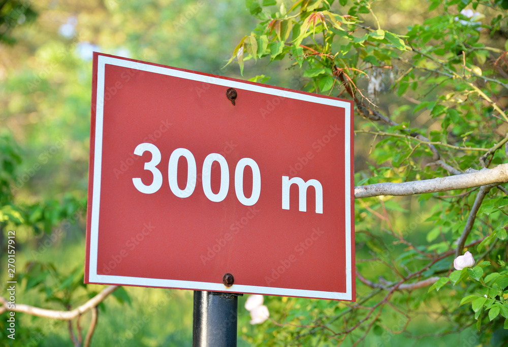 3000 meters direction sign in nature Stock Photo | Adobe Stock