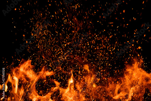 Detail of fire sparks isolated on black background Tableau sur Toile