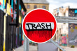 © Peteris Zalitis - No entry sign with word Trash spaypainted on it