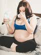 © thodonal - Pregnant woman blowing her nose