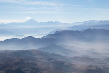 Misty blue Andean mountain landscape background