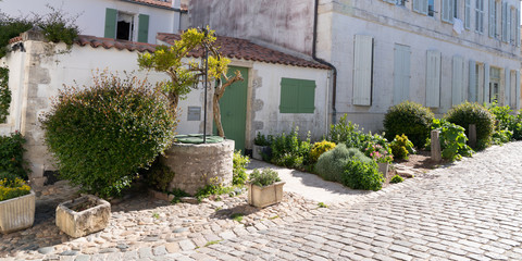 Wall Mural - street at Saint Martin de Re village situated on Ile de Re