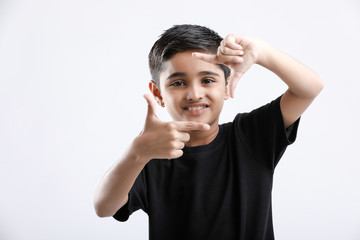 Cute Indian little boy giving multiple expression