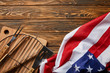 top view of american flag near bbq equipment on wooden rustic table