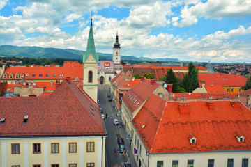 Canvas Print - Amazing colorful rooftops and skyline with St. Mark's church of  Zagreb Old town, Croatia. 