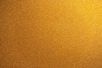 Wall Mural - abstract gold glitter paper texture background or backdrop. empty shimmer paper or yellow shiny pape
