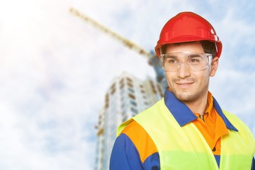 Canvas Print - Portrait of happy young foreman with hard hat