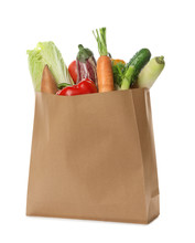 Paper Bag With Vegetables On White Background