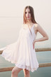 © Iveta - Lifestyle caucasian woman in white summer dress