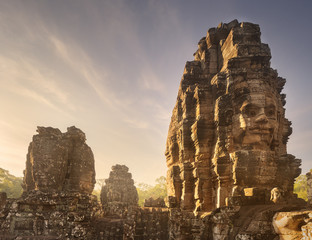 Day view of ancient temple Bayon Angkor with stone faces Siem Reap, Cambodia