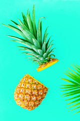  Pineapple fruit half cut on yellow background