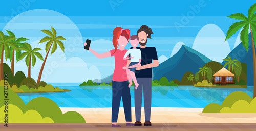 Family On Beach Taking Selfie Photo On Smartphone Camera Summer