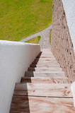 Fototapeta  - Escaleras de madera a pleno sol