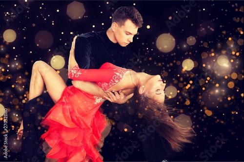 Naklejki taniec man-and-a-woman-dancing-salsa-on-background