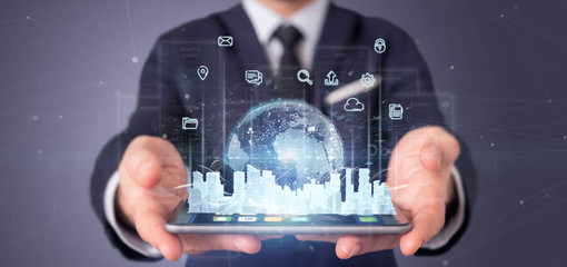 Poster - Businessman holding Smart city user interface with icon, stats and data 3d rendering