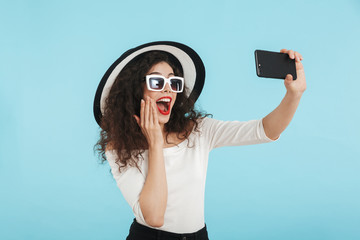 Wall Mural - Happy beautiful brunette woman wearing summer outfit