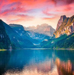 Wall Mural - Dramatic summer sunrise on Vorderer ( Gosausee ) lake. Impressive morninf scene of Austrian Alps. Upper Austria, Europe. Beauty of nature concept background.