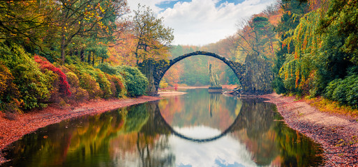 Wall Mural - unbelievable morning scene of azalea and rhododendron park kromlau, germany, europe. great autumn pa