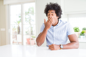 Sticker - African American business man bored yawning tired covering mouth with hand. Restless and sleepiness.