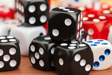 Dice on a wooden table. Concept for business risk.