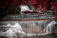 Long Exposure Waterfall In The Park And Change The Leaves Color Over Red
