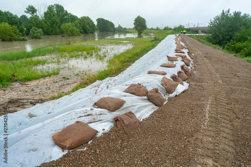 flooding of river embankments reinforcement to delimit the full emilia ...