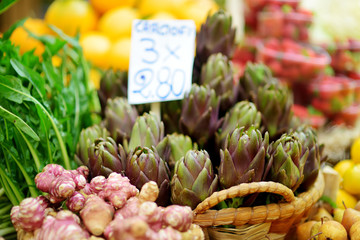 Assorted organic artichokes sold on a marketplace in Genoa, Italy