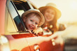 © JenkoAtaman - happy family mother and child boy goes to summer travel trip in car