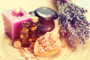 Poster - Pile of lavender flowers and a dropper bottle with lavender essence