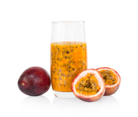 Wall Mural - Fresh passion fruit juice in glass with green leaf isolated on white background, fruit healthy concept